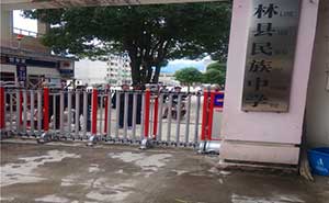 上林縣民族中學(xué)伸縮門案例 - 中出網(wǎng)-智能出入口門戶