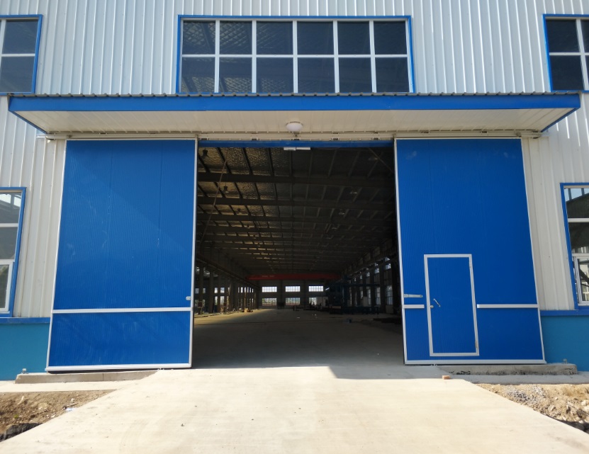 河南四建股份公司工業(yè)雙開推拉門案例 - 中出網-智能出入口門戶