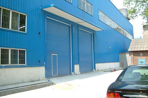 湘潭漣鋼工業(yè)提升門案例 - 中出網-智能出入口門戶
