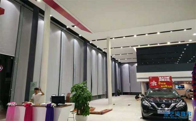 東莞長(zhǎng)安東風(fēng)4S店展廳超高電動(dòng)窗簾案例 - 中出網(wǎng)-智能出入口與停車充電門戶